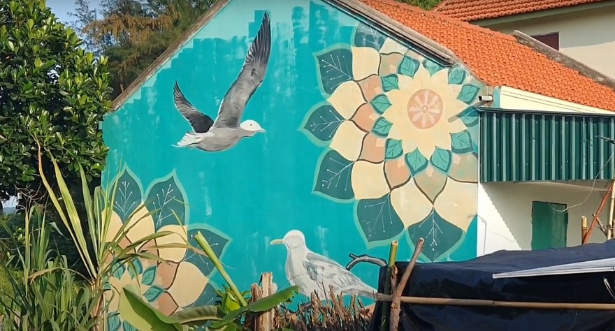 Murals adorning the walls of the Mural Village