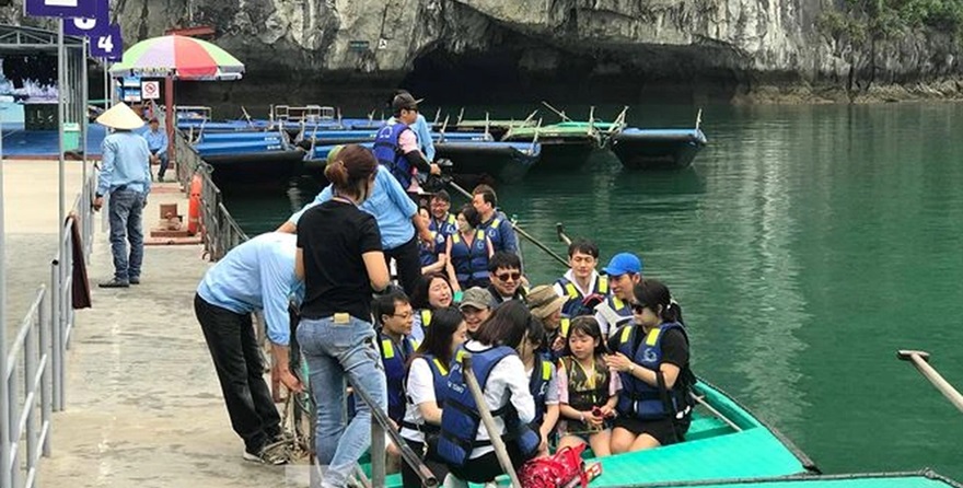 Rowing a bamboo boat in Ha Long Bay