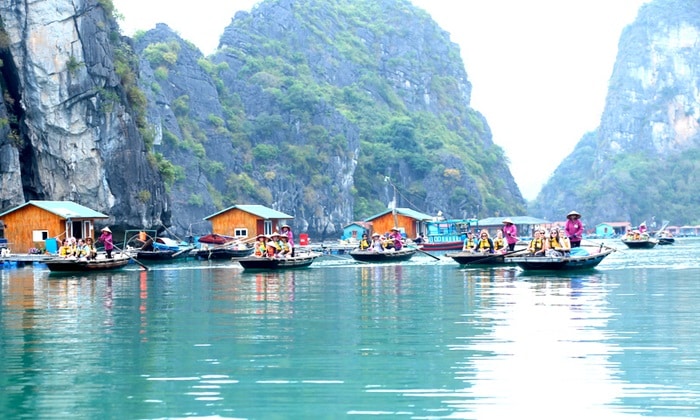 Visitors exploring Vung Vieng
