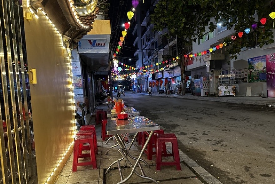 Quiet shops stand completely devoid of patrons