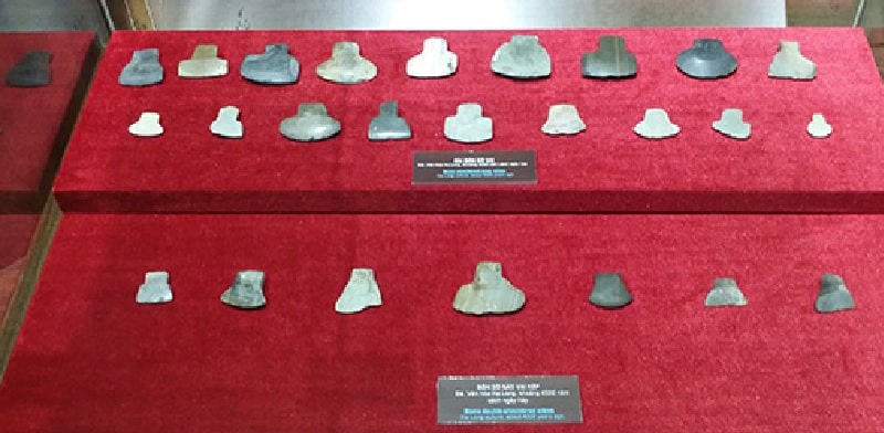 Stepped-shoulder and double-shouldered stone adzes