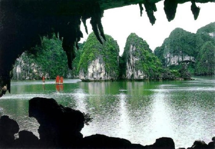 Photographer Nguyen Duy Kien capturing the view from inside Bo Nau Cave in 1958